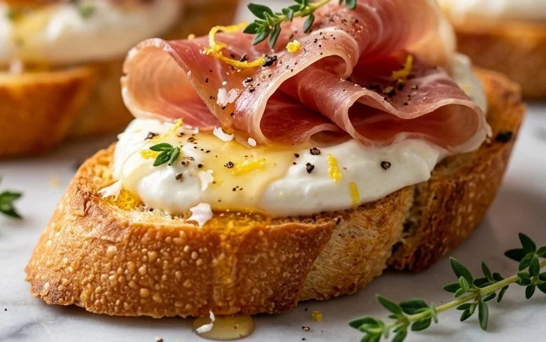 Beef Prosciutto Crostini with Burrata and Lemon Honey Drizzle